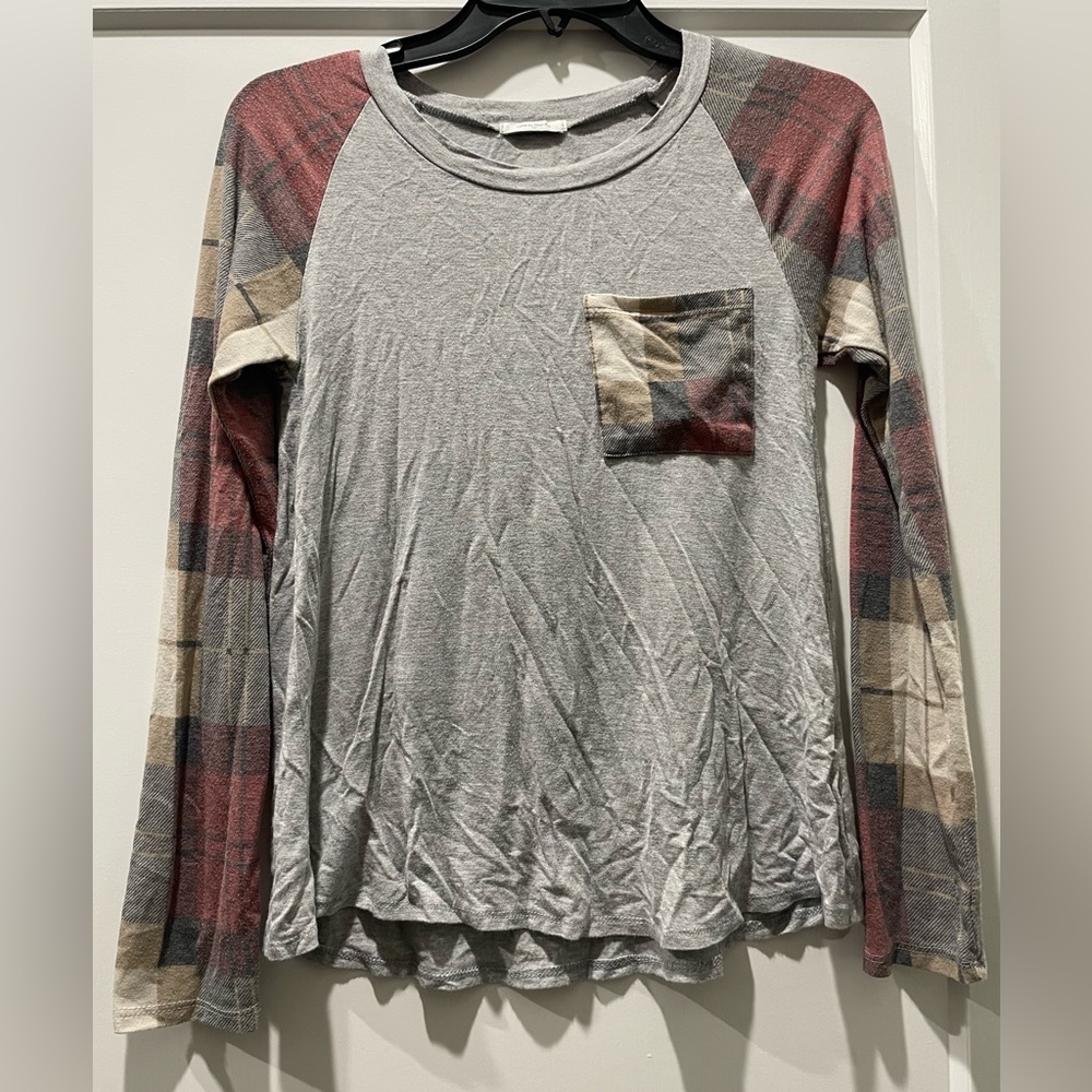Pocket and patchwork long sleeve boutique top